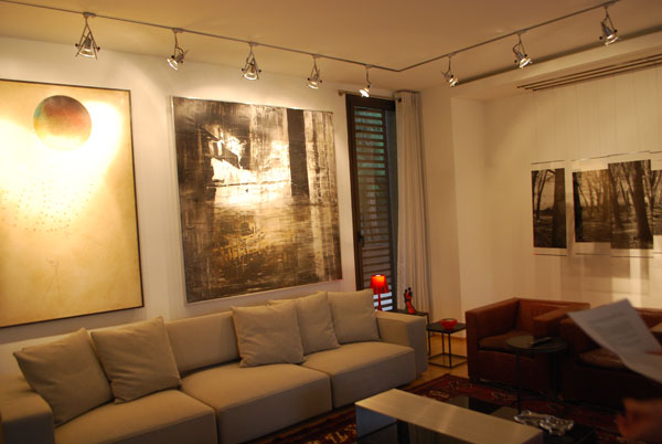 DSC 0921, grey sofa, chocolate sofa, artwork on walls, spotlights on a track
