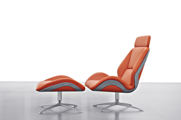 orange leather armchair, leather ottoman